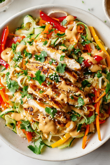 Creamy peanut sauce recipe for quick meals and holiday gatherings, enhancing noodles, salads, and grilled meats with rich flavor.