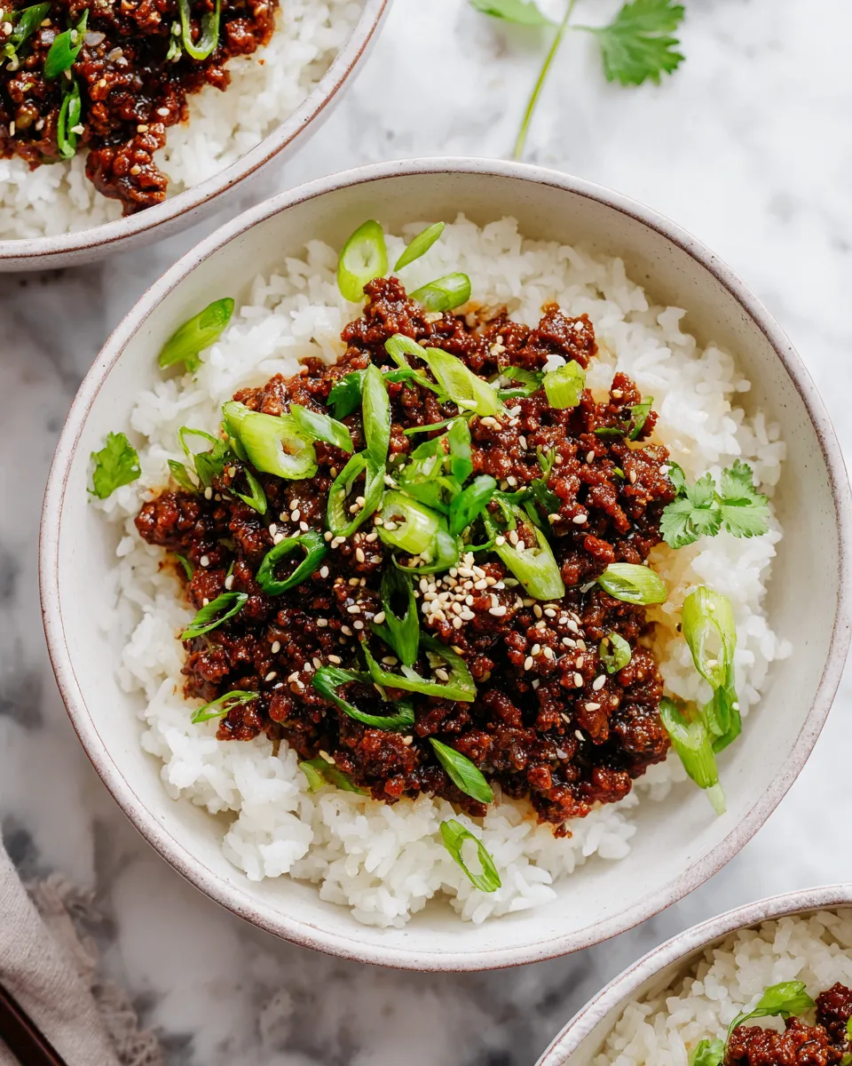Ground Beef Teriyaki recipe featuring savory beef and nutty sesame oil, quick meal prep, under 30 minutes cooking time.