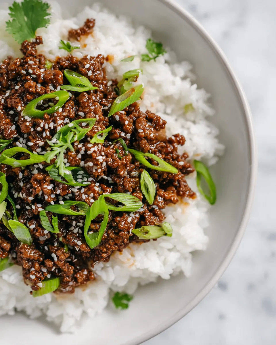 Ground Beef Teriyaki recipe featuring savory beef and nutty sesame oil, quick meal prep, under 30 minutes cooking time.