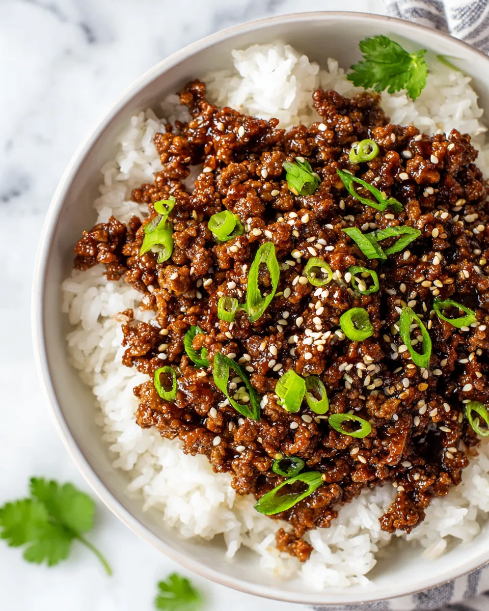 Ground Beef Teriyaki recipe featuring savory beef and nutty sesame oil, quick meal prep, under 30 minutes cooking time.