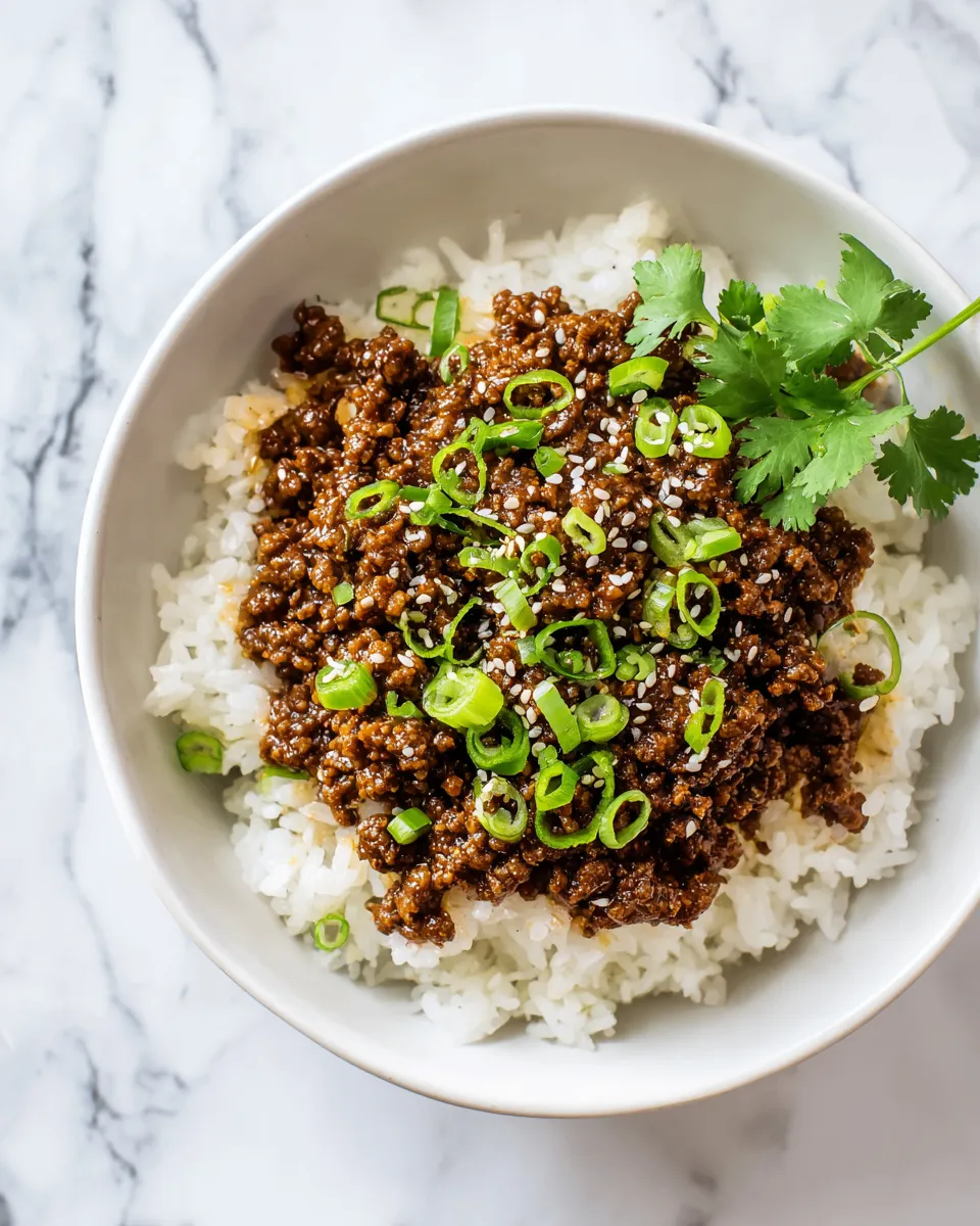Ground Beef Teriyaki recipe featuring savory beef and nutty sesame oil, quick meal prep, under 30 minutes cooking time.