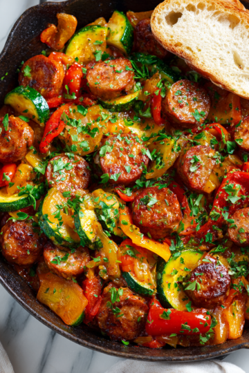 Delicious skillet sausage and zucchini dish packed with flavor, perfect for cozy dinners and quick weeknight meals. - Savor This Hearty Skillet Sausage and Zucchini