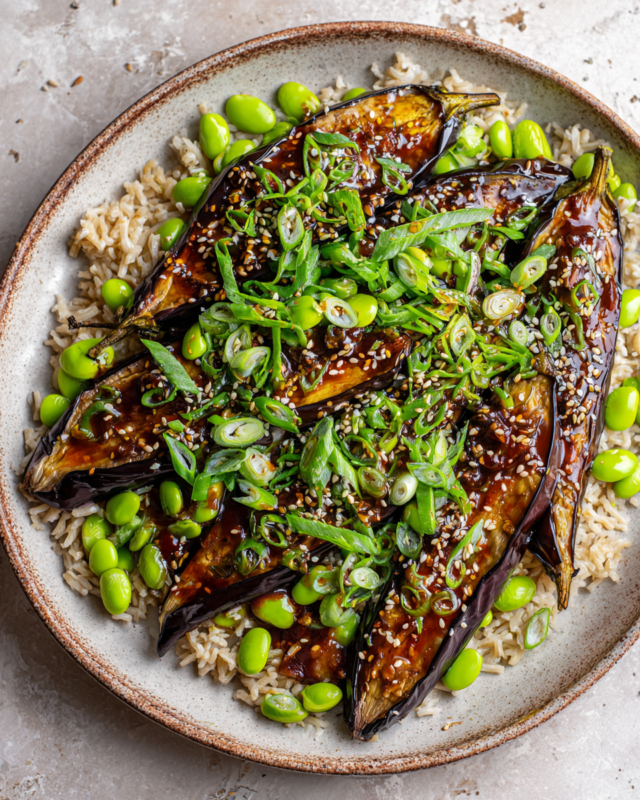 Miso Aubergine with Edamame Beans and Brown Rice, a hearty vegan dish ideal for fall gatherings.