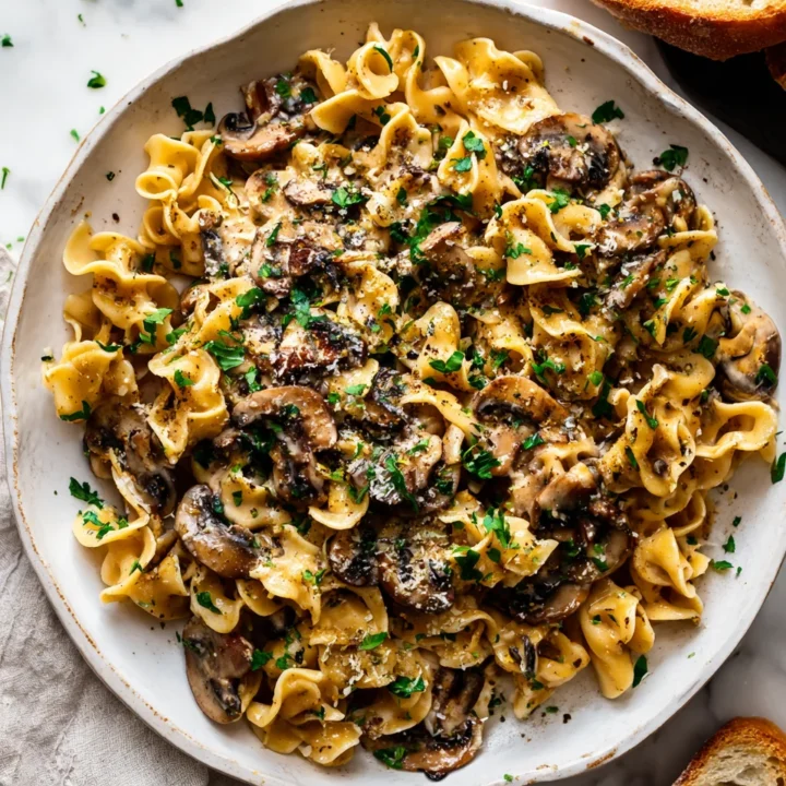 Delicious Mushroom Stroganoff Pasta combining earthy mushrooms and a creamy sauce, perfect for cozy dinners.