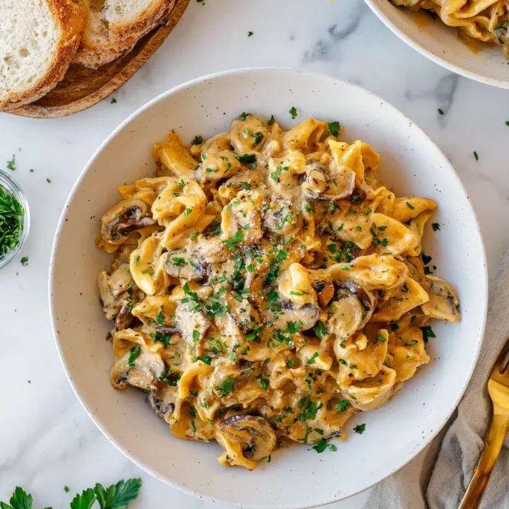 Delicious Mushroom Stroganoff Pasta combining earthy mushrooms and a creamy sauce, perfect for cozy dinners.