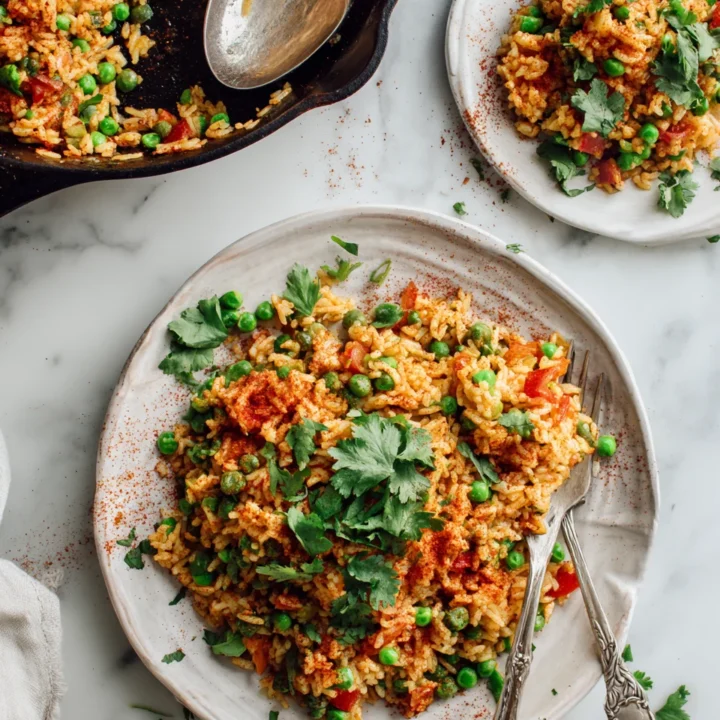 Colorful Nando's-inspired Spicy Rice ready to serve, perfect for holiday gatherings, nourishing and flavorful dish, easy stovetop recipe.